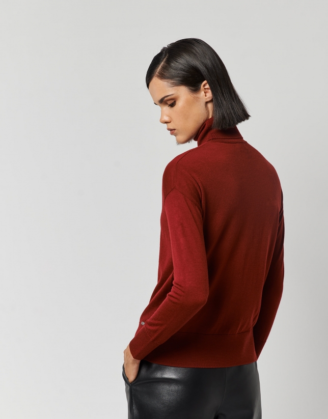 Burgundy fine knit sweater with turtleneck.