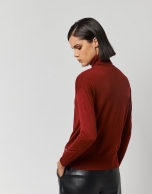 Burgundy fine knit sweater with turtleneck.