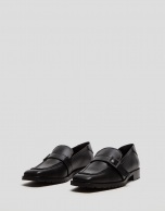 Black leather moccasins