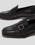 Black leather moccasins