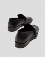 Black leather moccasins