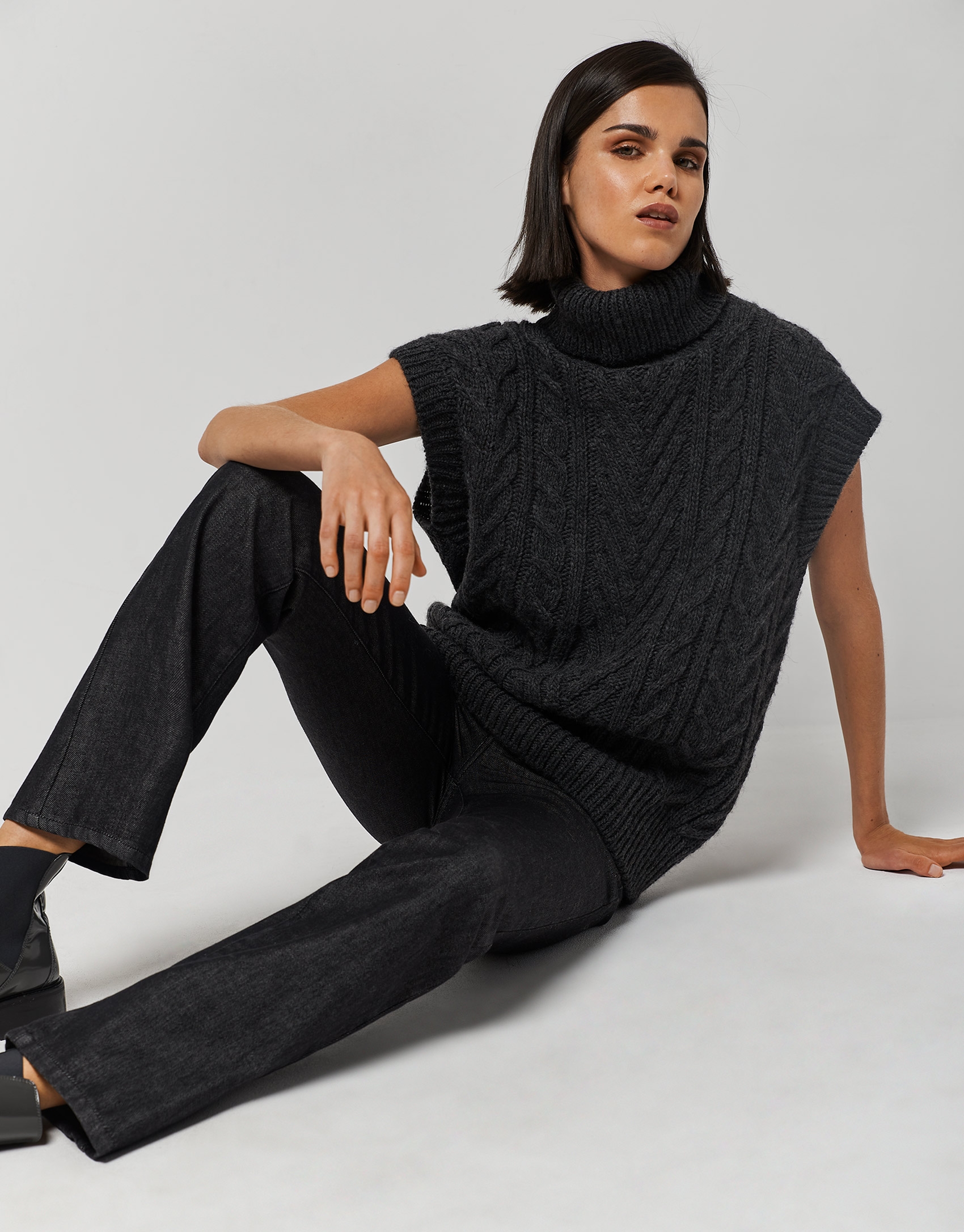 Dark grey knit vest with turtleneck
