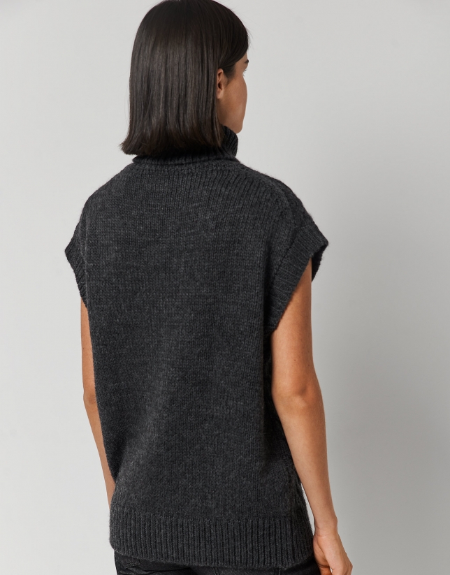 Dark grey knit vest with turtleneck