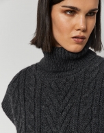 Dark grey knit vest with turtleneck