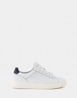 White trainers with blue heel