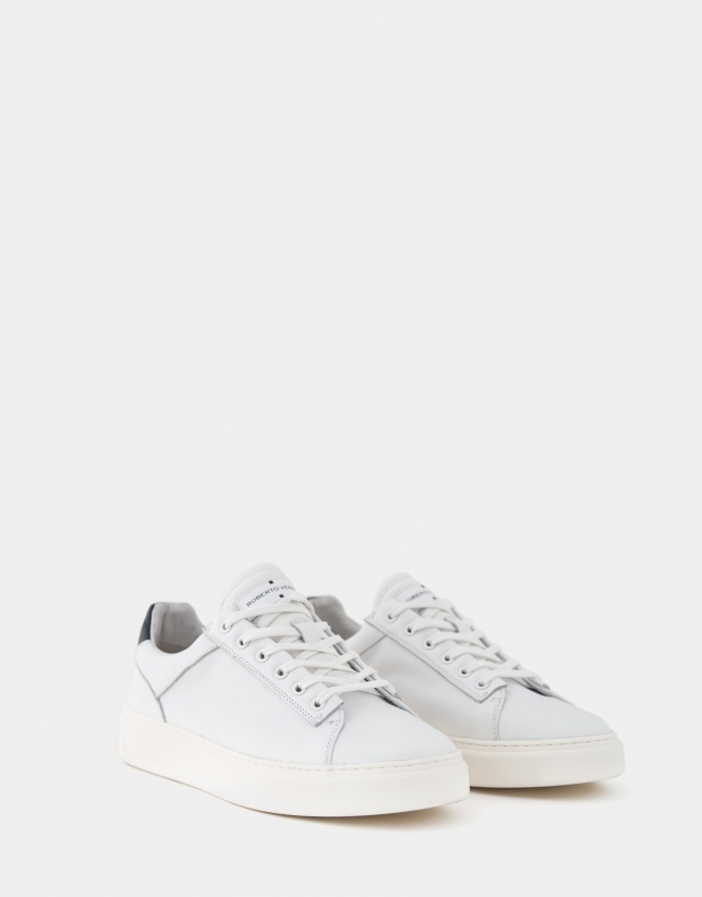 White trainers with blue heel