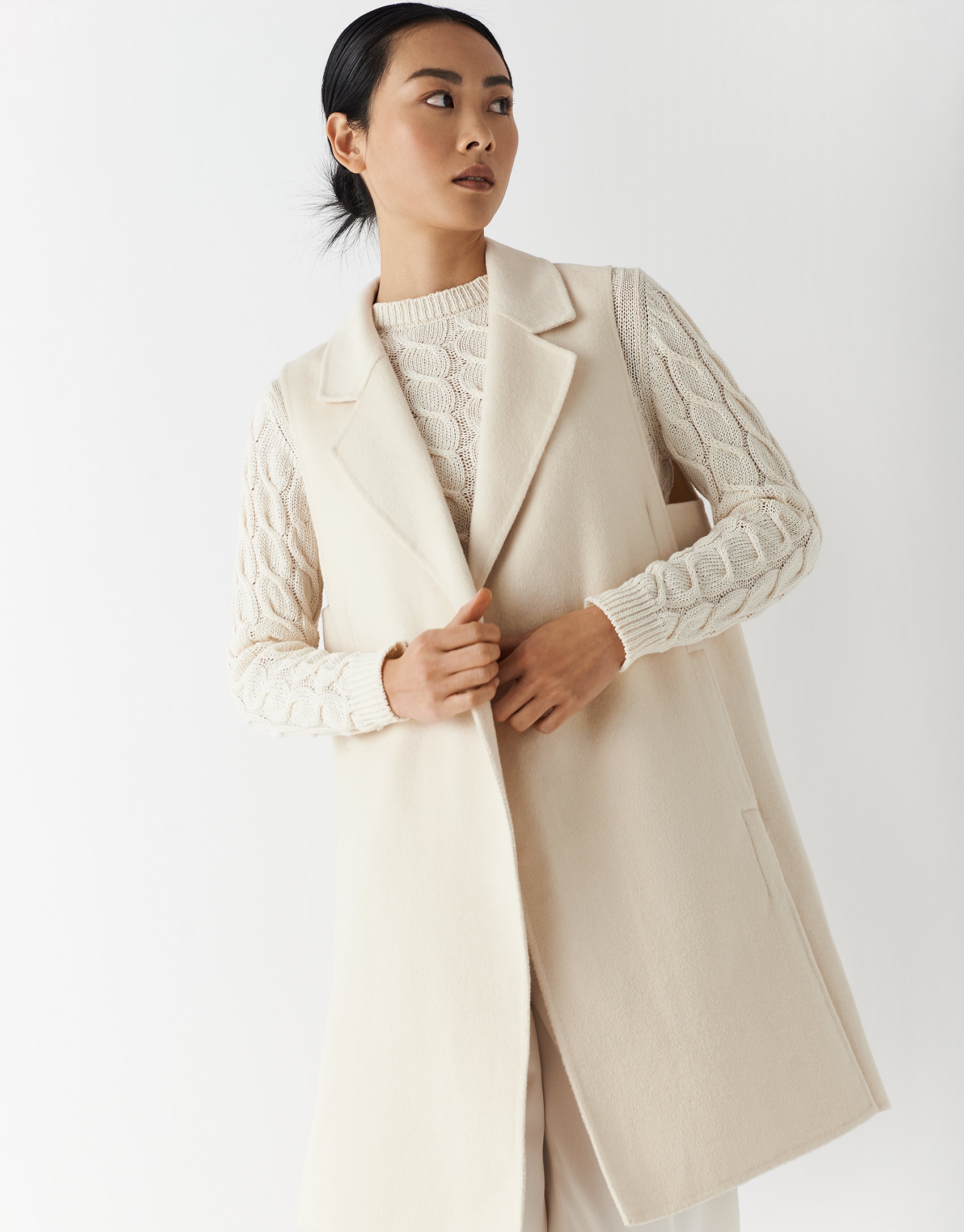 Long beige vest with lapels