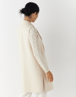 Long beige vest with lapels