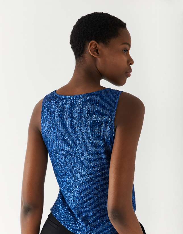 Blue sleeveless top with sequins