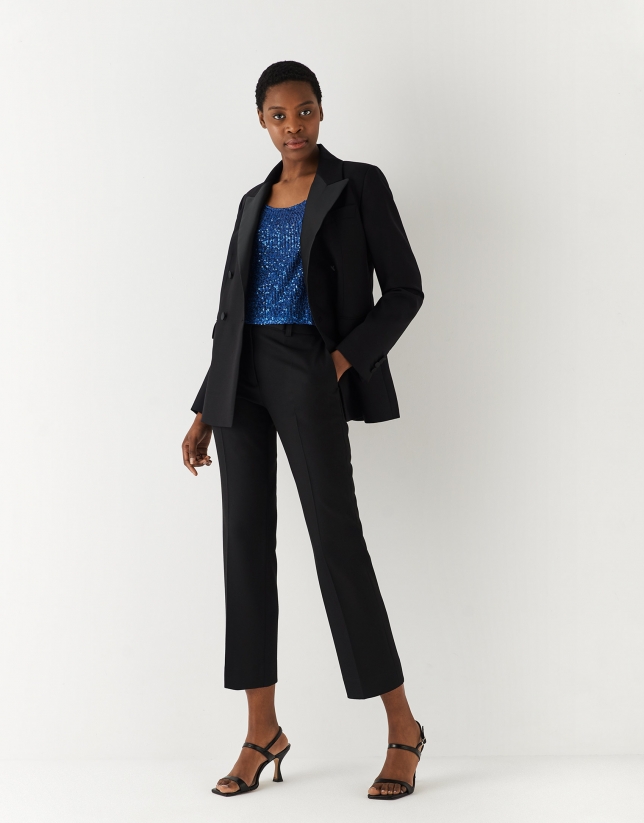 Blue sleeveless top with sequins