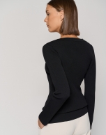 Black ribbed sweater with lace and V-neck