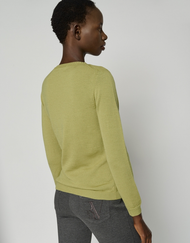 Green sweater with braiding and boat neck