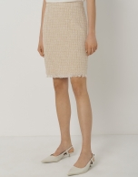 Sand-colored short tweed skirt with fringed hem