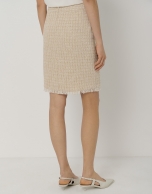Sand-colored short tweed skirt with fringed hem
