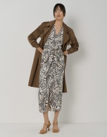 Sarong-style twill skirt with black and cream leaf print