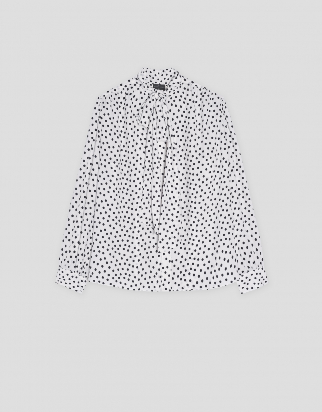 Blouse with bow and black and white dotted print
