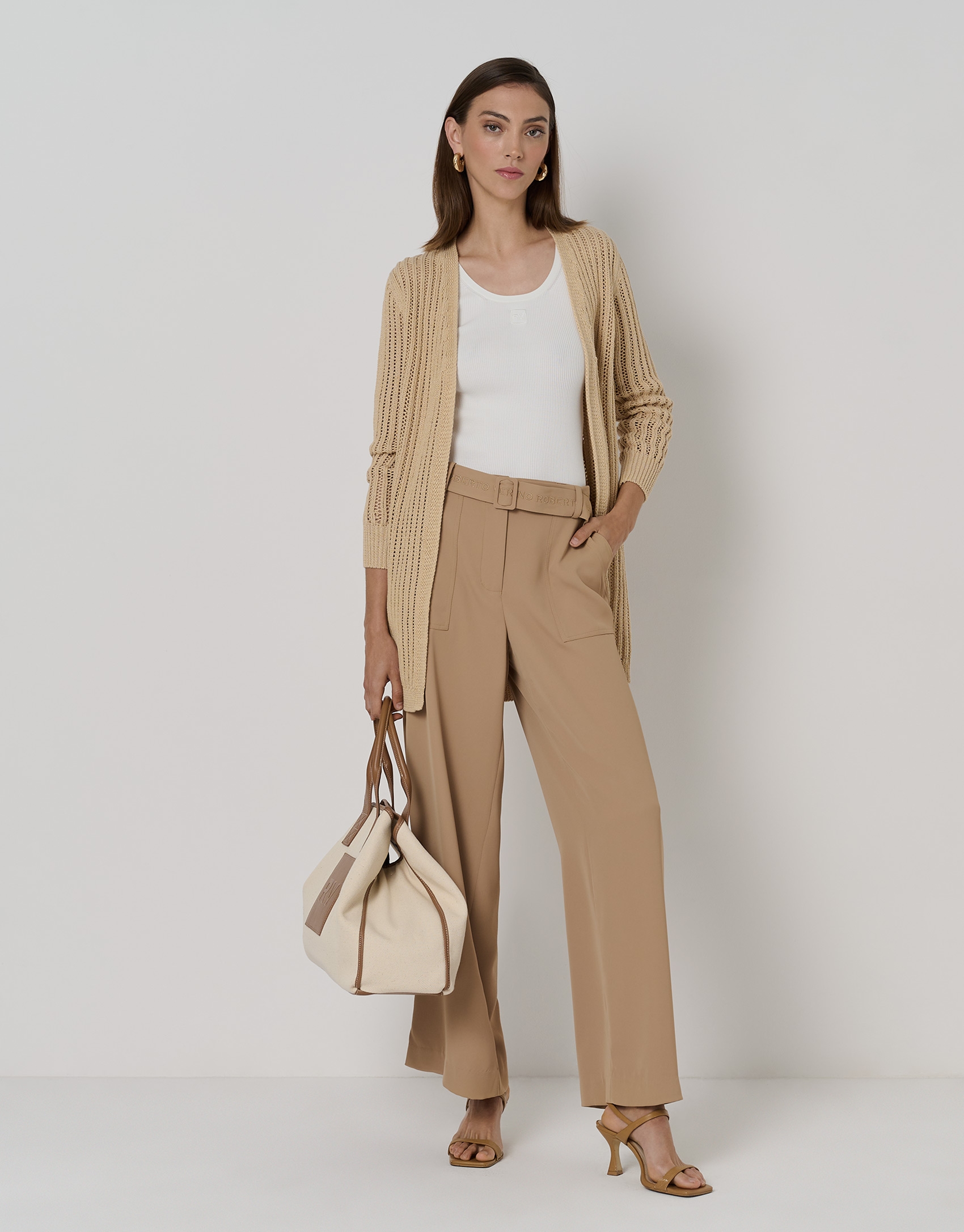 Long cream-colored ribbed knit jacket