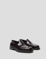 Men's brown leather loafers with mask