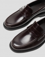 Men's brown leather loafers with mask