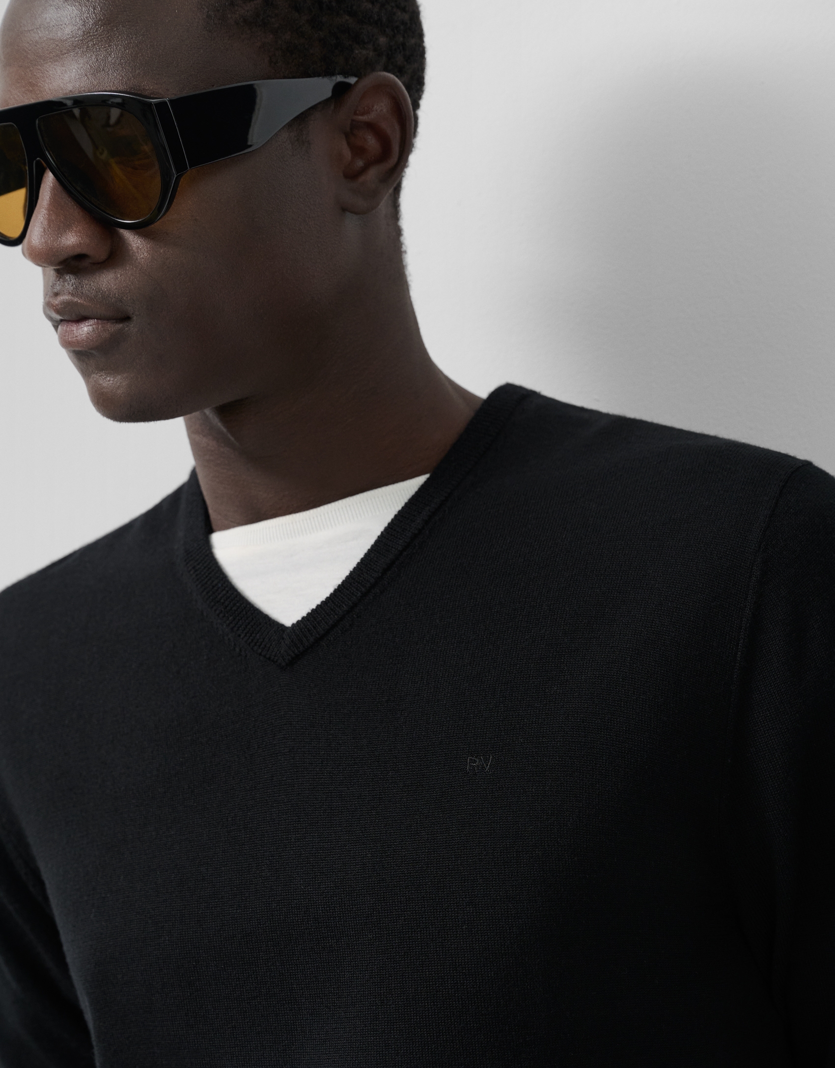 Black wool sweater with V-neck