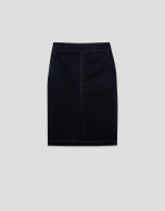 Navy blue skirt with slit and beige back-stitching