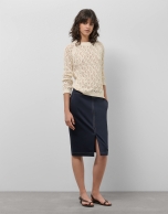 Navy blue skirt with slit and beige back-stitching