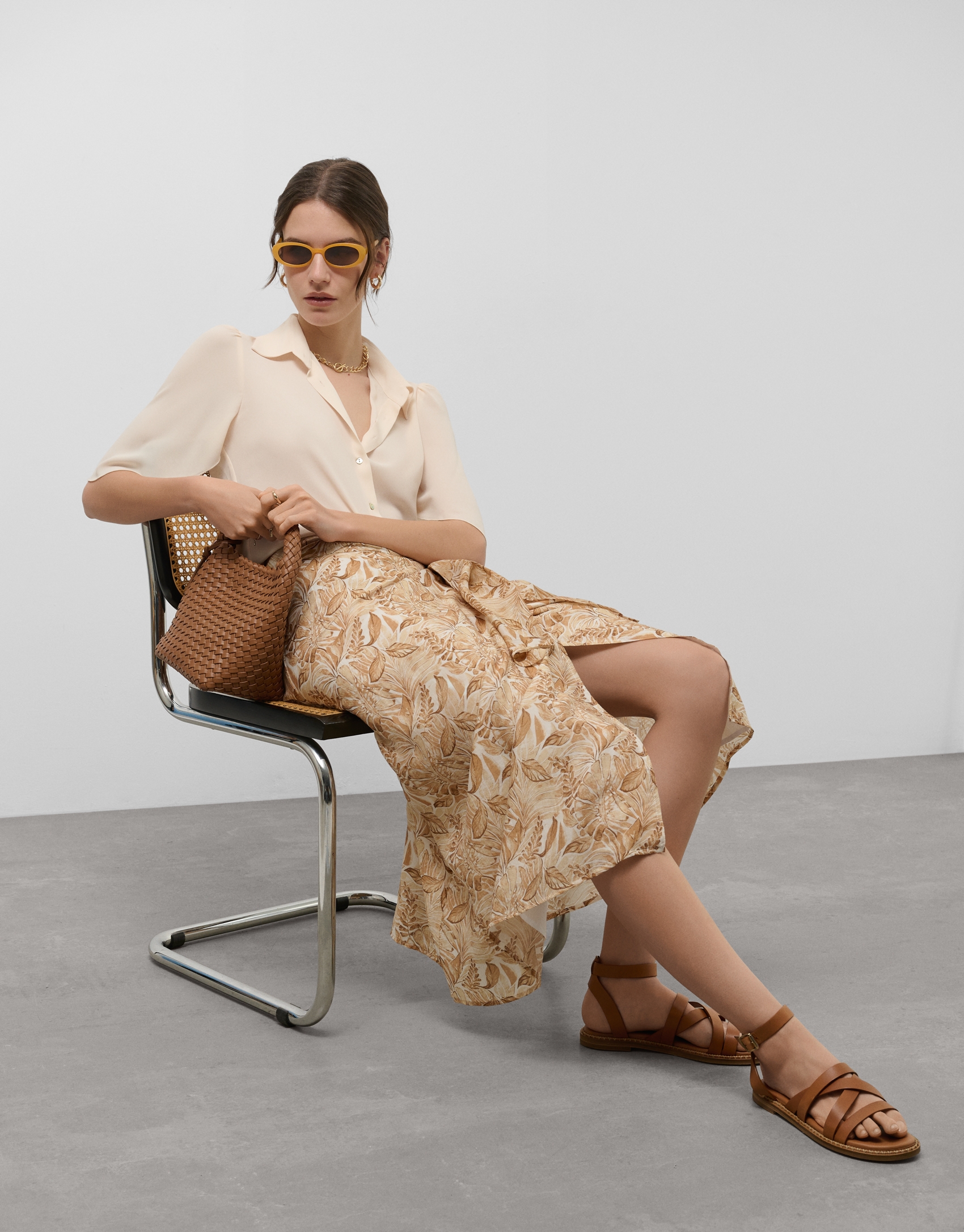 Beige sarong-style chiffon midi skirt with decorative plant print