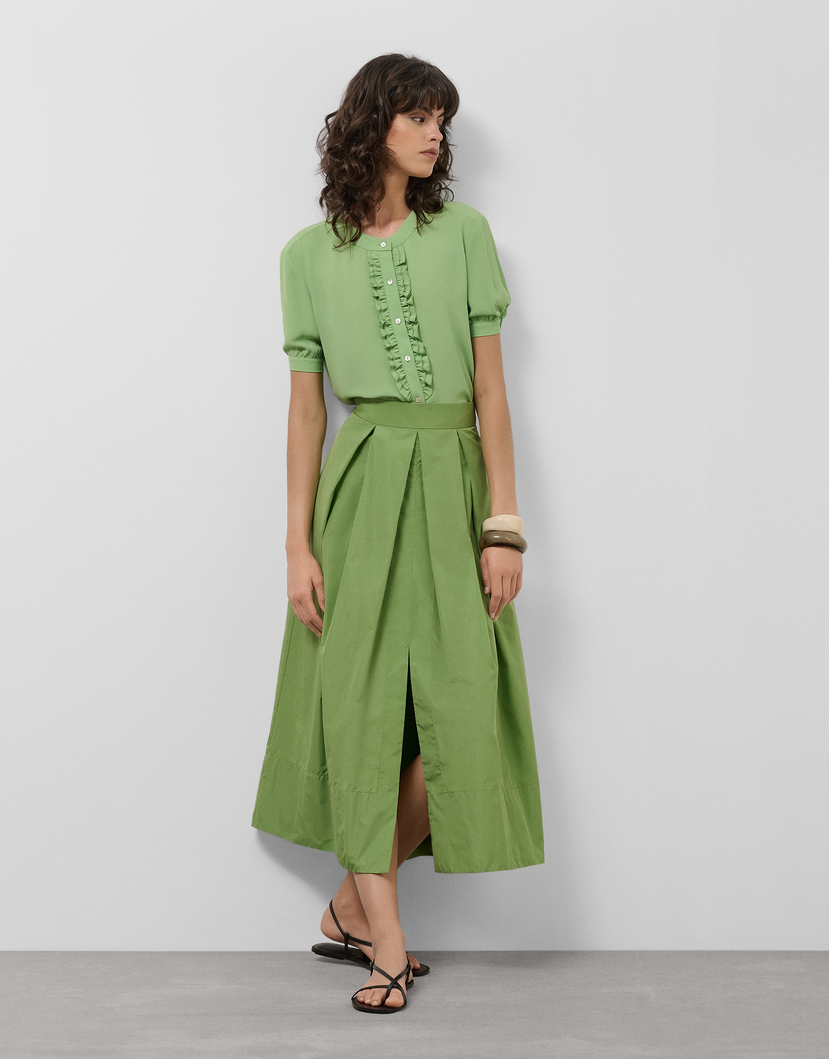 Green fluid fabric blouse with front ruffle