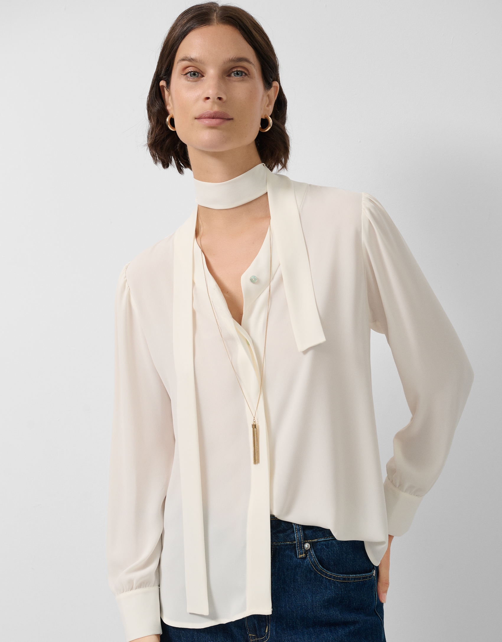 Cream oversize blouse with tie collar