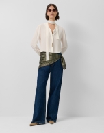 Blusón oversize cuello lazada crudo