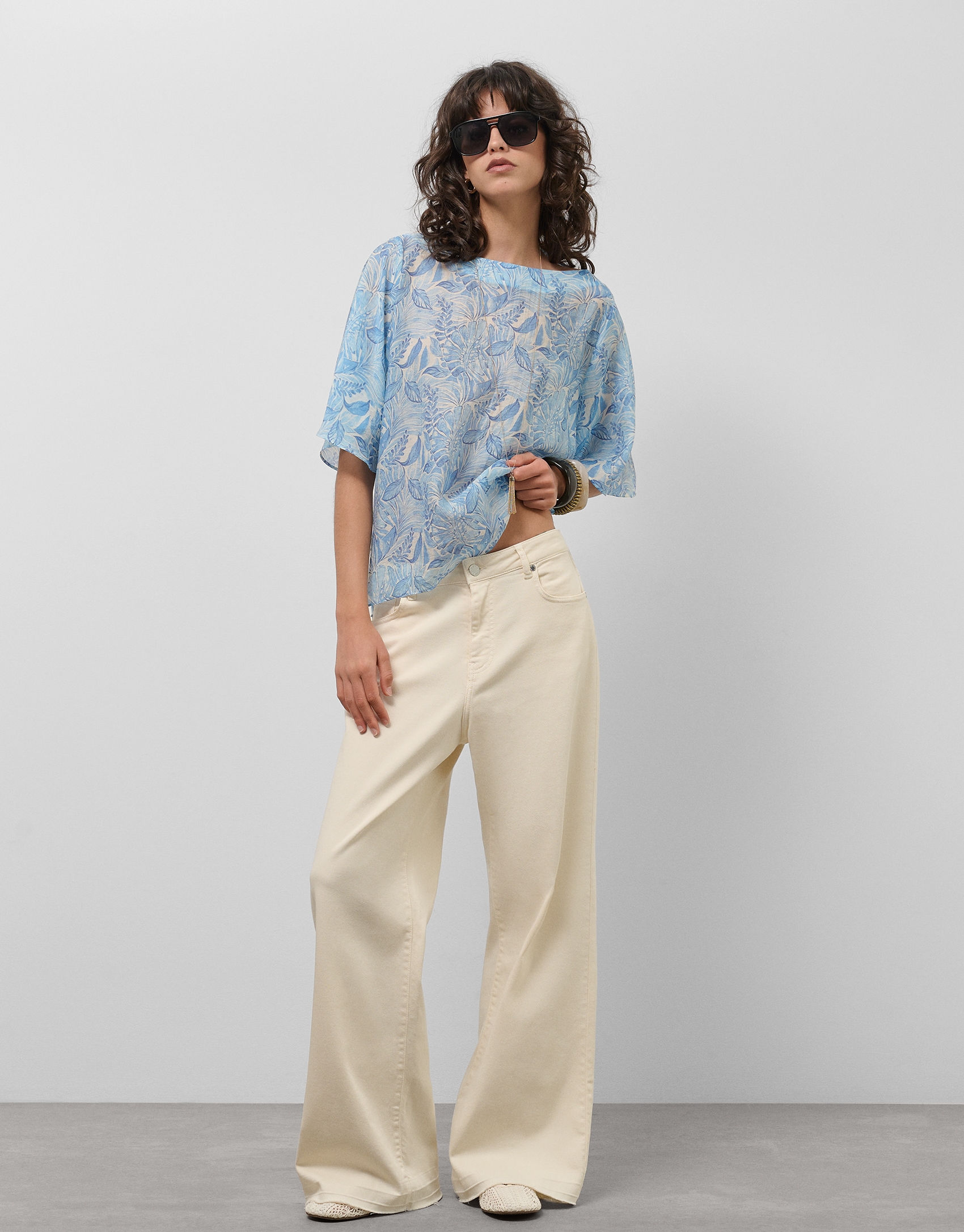 Loose blue chiffon blouse with decorative plant  print