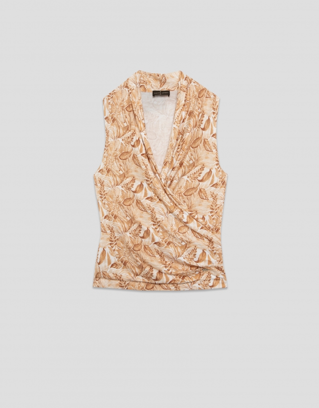 Beige crossover top with floral print