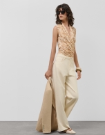 Beige crossover top with floral print