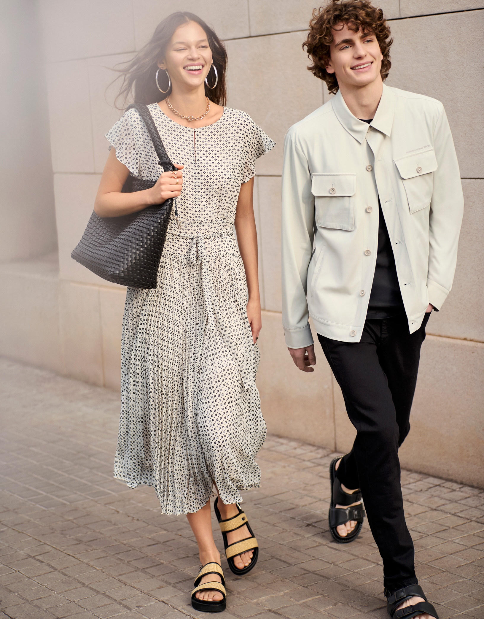 Black and white midi dress with pleats and geometric print