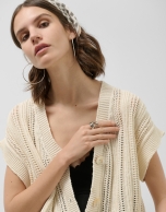 Ecru openwork knitted waistcoat with fringes