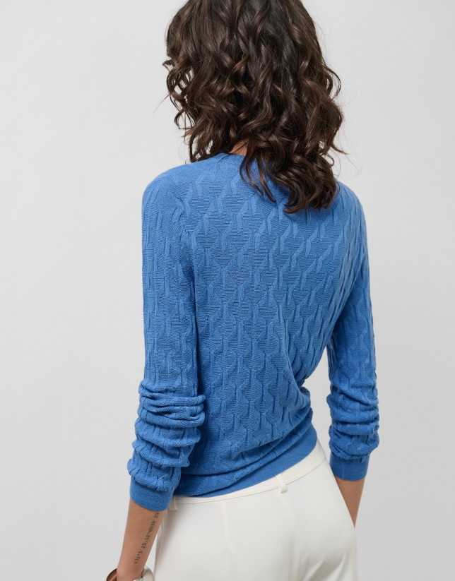 Navy blue cable knit long sleeve wool sweater