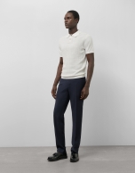 Structured white knitted polo shirt
