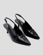 Black leather slingback pumps with cut-outs