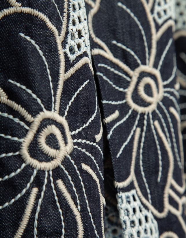 Blue midi denim skirt with floral embroidery and openwork