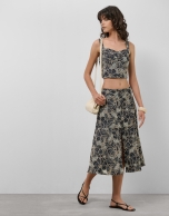 Blue midi denim skirt with floral embroidery and openwork