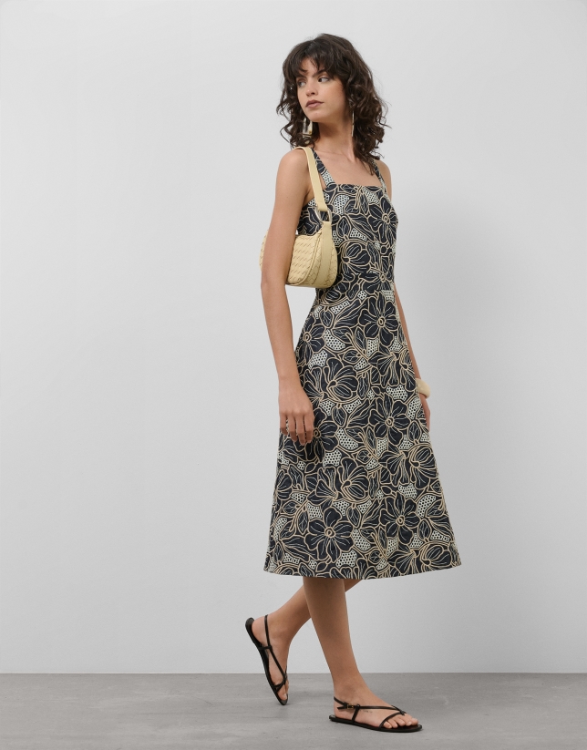 Blue denim halter midi dress with floral embroidery and openwork