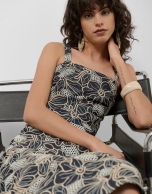 Blue denim halter midi dress with floral embroidery and openwork
