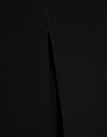 Wide-legged black crepe trousers with slit