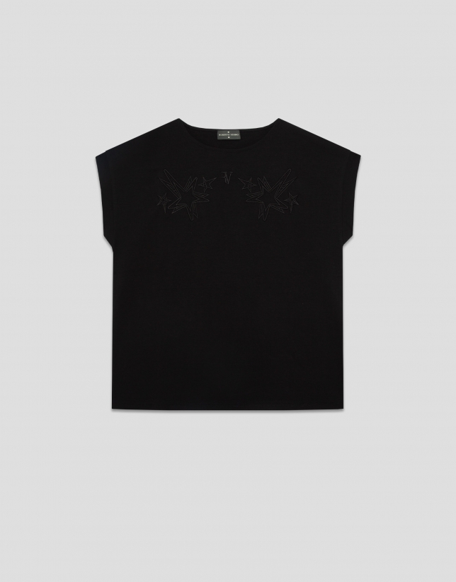 Camiseta sin mangas oversize negra con estrellas