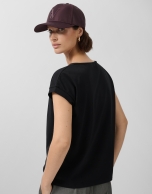 Camiseta sin mangas oversize negra con estrellas