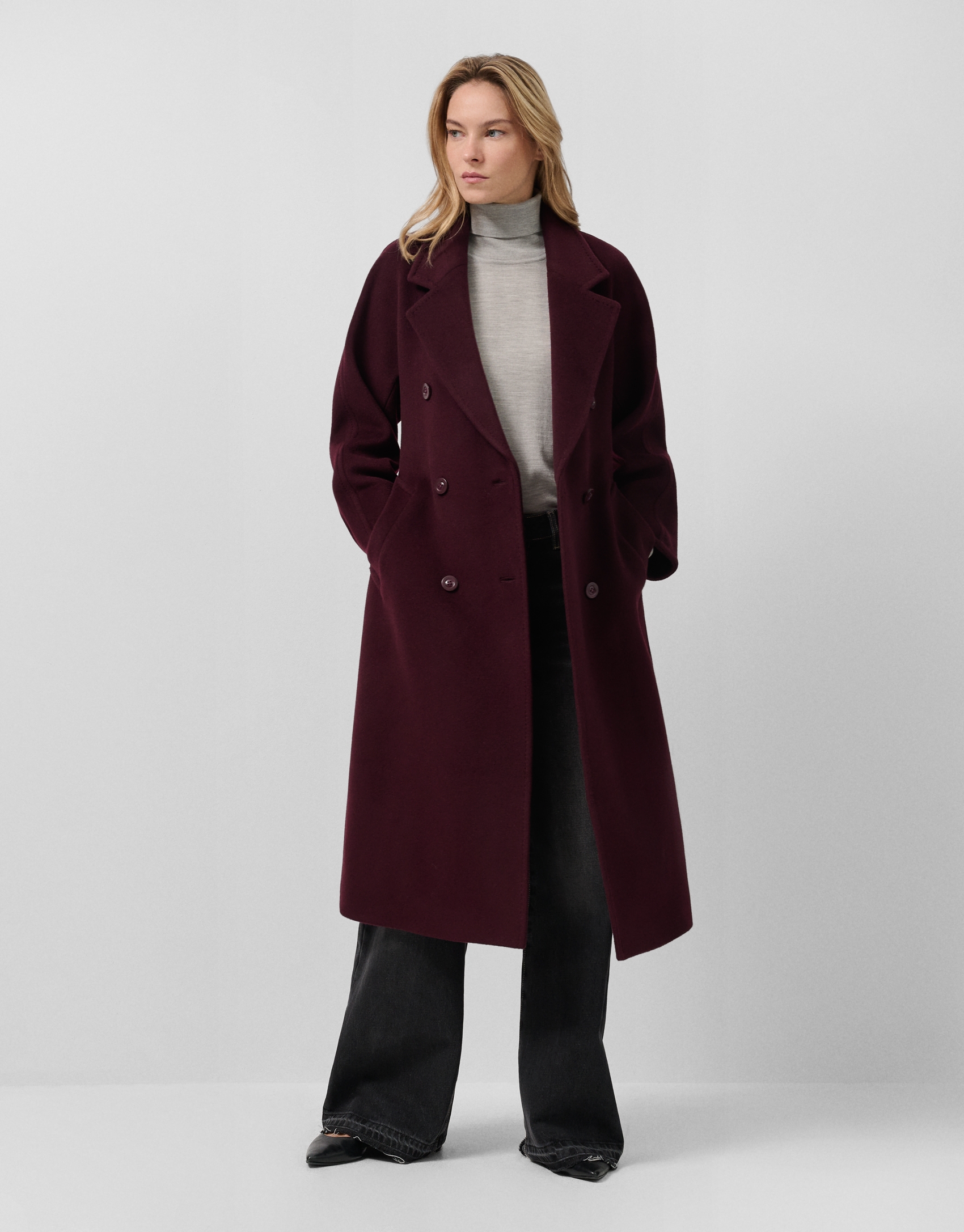 Long aubergine-coloured double-breasted coat