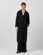 Long double-breasted coat in black cloth.
