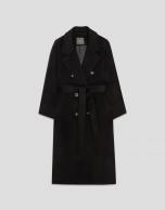 Long double-breasted coat in black cloth.