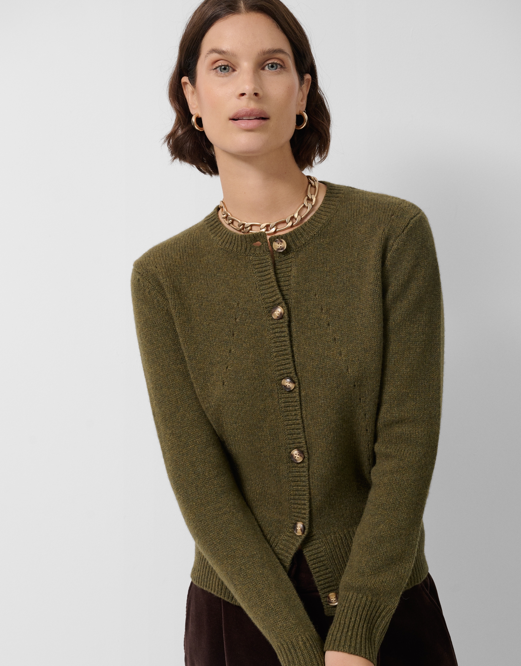 Chaqueta lana verde con dibujos calados