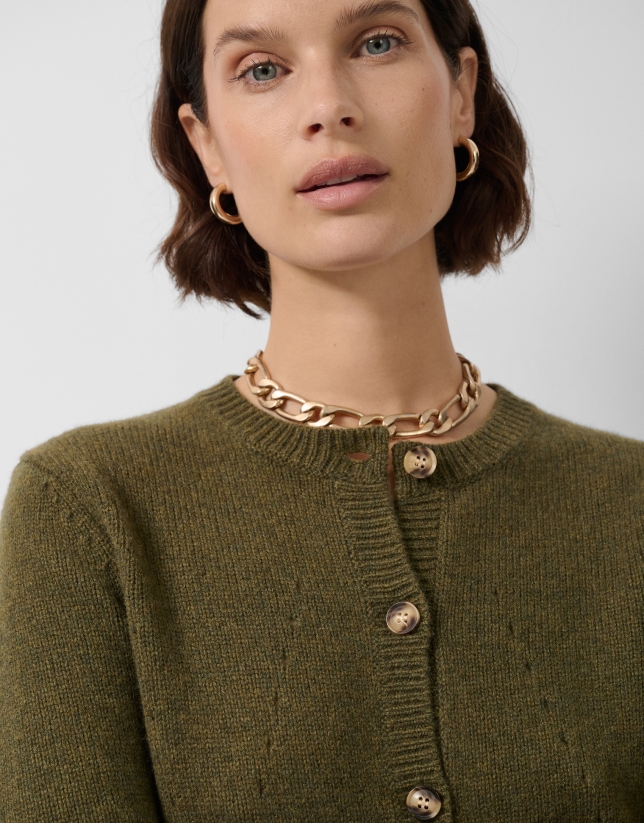 Chaqueta lana verde con dibujos calados